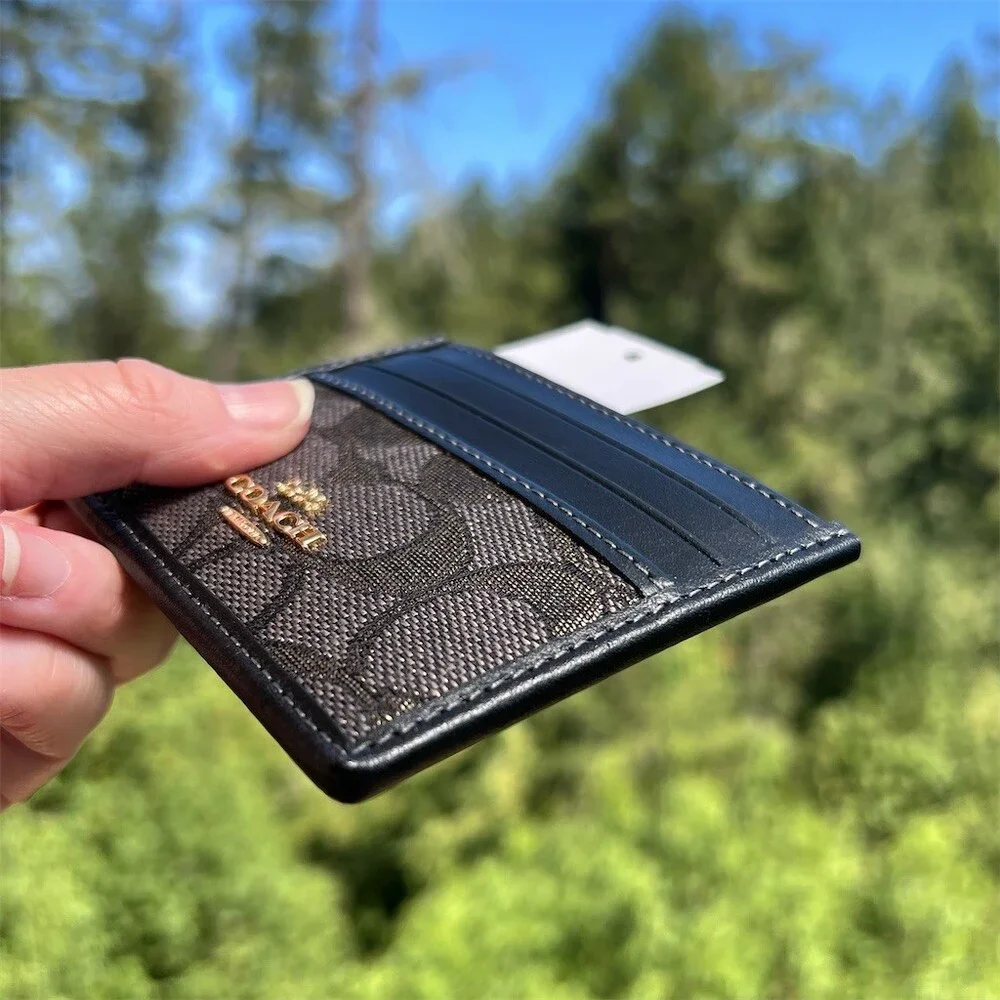 Coach charcoal gold